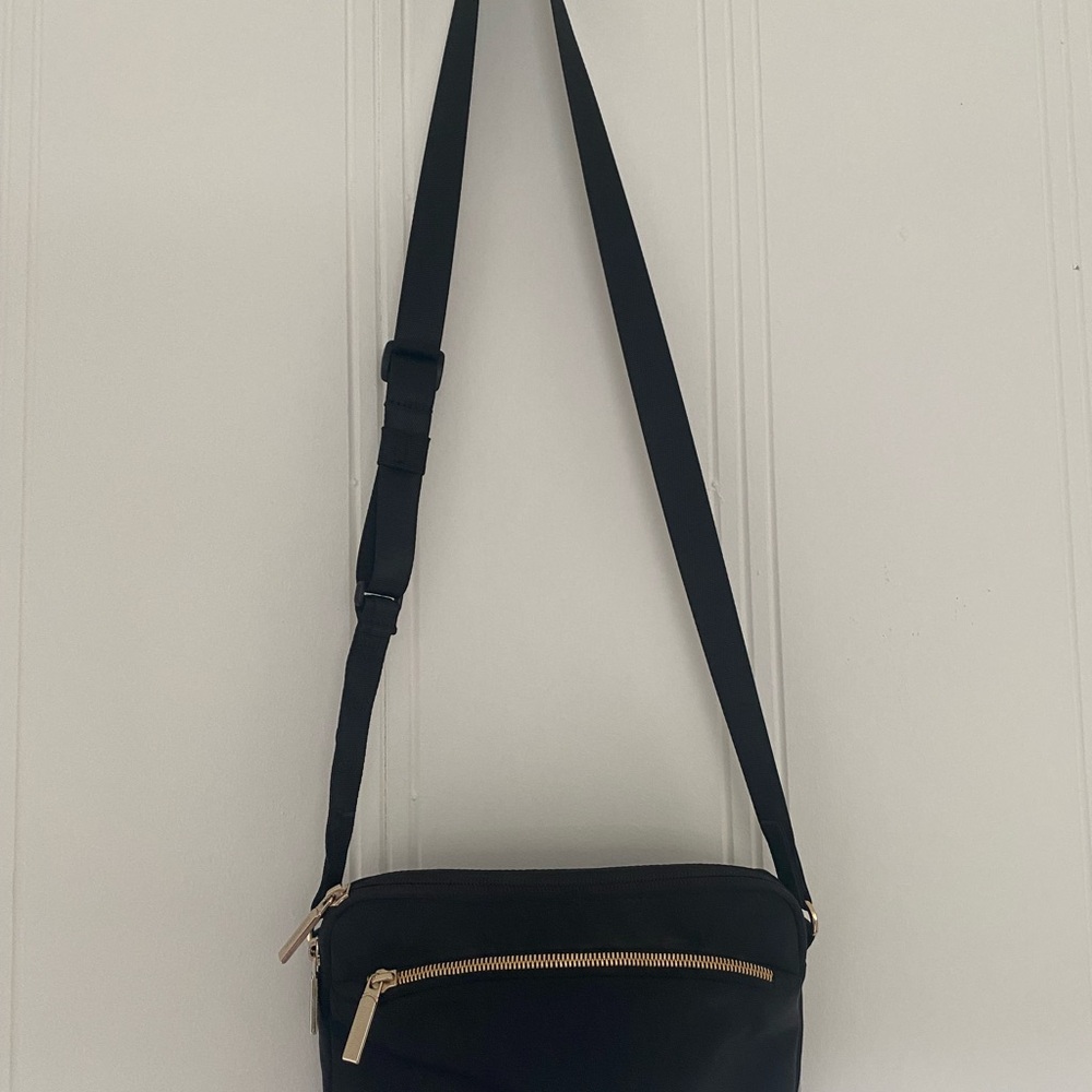 Lululemon Athletica Black Crossbody Bag with Gold Accents